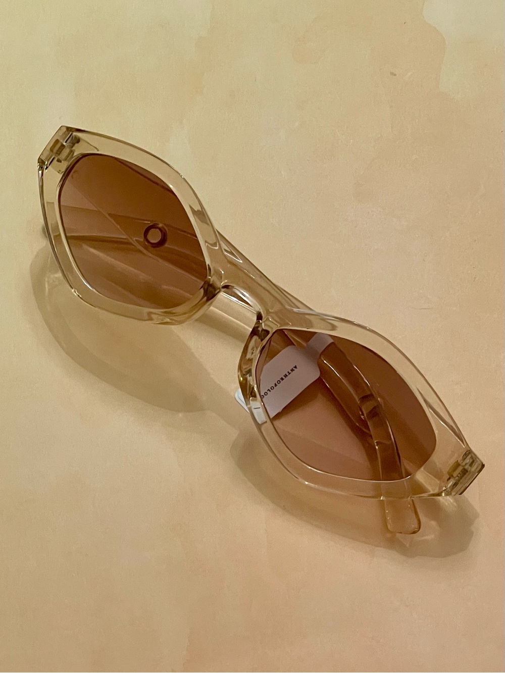 Anthropologie Transparent Brown Slim Geometric Oval Sunglasses - Eyelet Accents